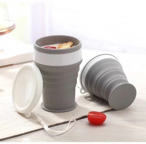 Anti slip and non hot hand folding cup with strap, portable, foldable, and able to hold boiling water compressed silicone folding cup